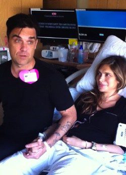 Robbie Williams y su mujer antes del parto