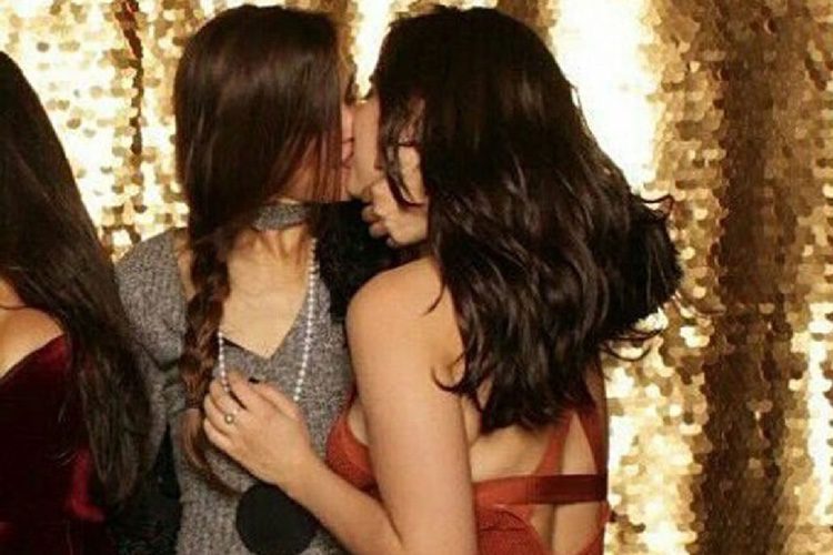 Lauren Jauregui besándose con Lucy Vives en una boda familiar 