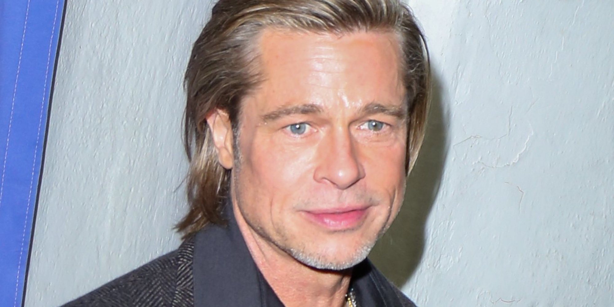 Brad Pitt, pillado con una misteriosa mujer en un concierto