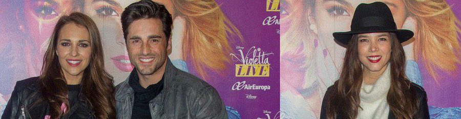 Paula Echevarría y David Bustamante disfrutan a duras penas del concierto de 'Violetta' en Madrid