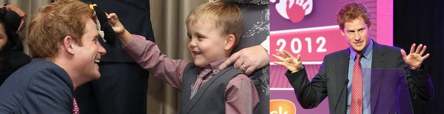 El Príncipe Harry reparte abrazos y sonrisas a los niños en su primer acto tras el escándalo de su desnudo