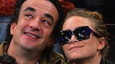 Mary-Kate Olsen y Olivier Sarkozy disfrutan viendo un partido de baloncesto muy acaramelados