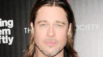 Brad Pitt cambia a Angelina Jolie por Doutzen Kroes en el estreno de 'Mátalos suavemente' en Nueva York