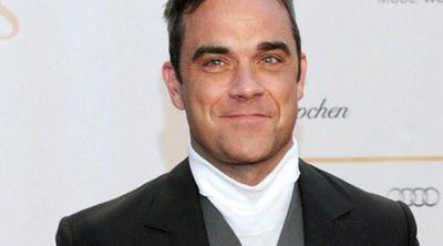 Robbie Williams confiesa que le costó un millón y medio de libras dejar Take That