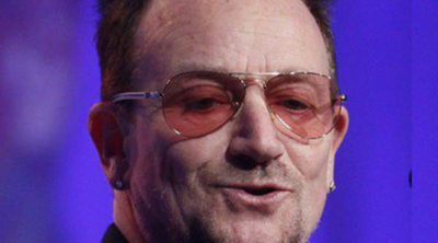 Bono pide delante de Merkel y Rajoy una campaña de la UE para ayudar a España