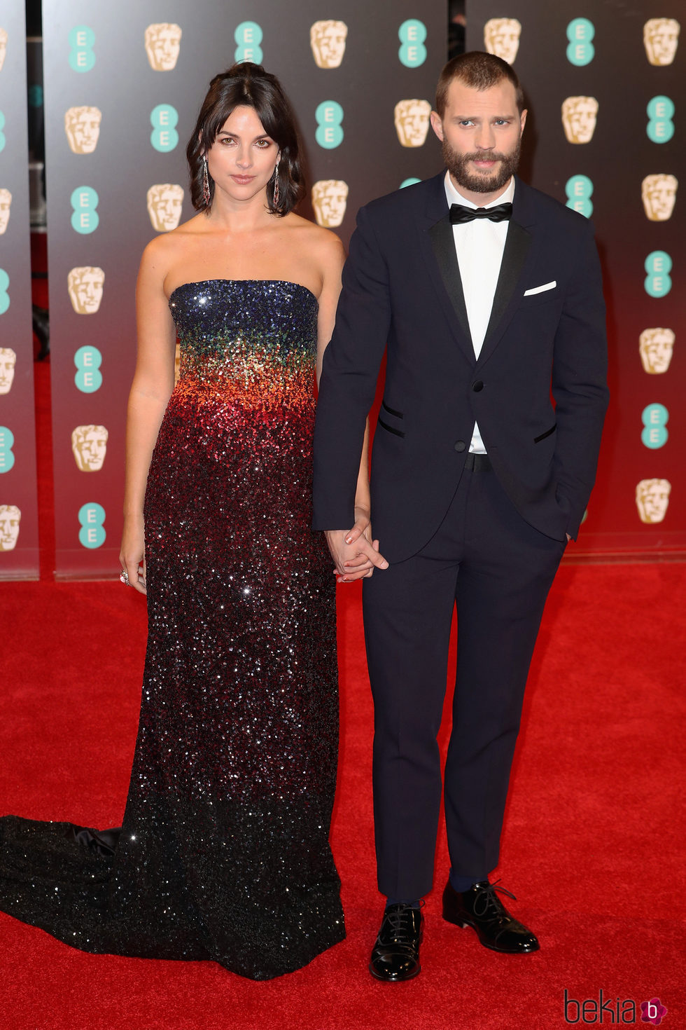 Jamie Dornan y Amelia Warner en la alfombra roja de los Premios Bafta 2017