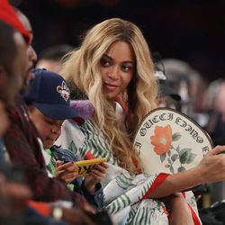 Beyoncé disfrutando junto a su marido Jay-Z y su hija Blue Ivy