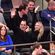 Ashley Olsen y Richard Sachs saludando en el partido New York-Brooklyn