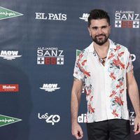 Juanes posando en el photocall del concierto 'Más es Más' de Alejandro Sanz