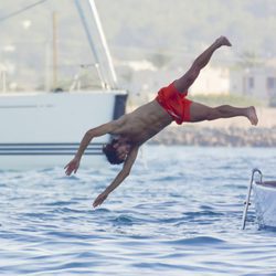 Feliciano López lanzándose al mar en Formentera
