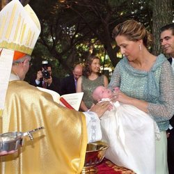 Irene Urdangarin en su bautizo con la Infanta Cristina y Pedro López Quesada