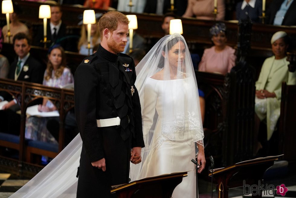El Príncipe Harry y Meghan Markle al comienzo de su boda