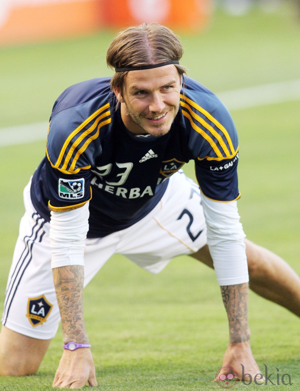 David Beckham con una Power Balance durante un partido