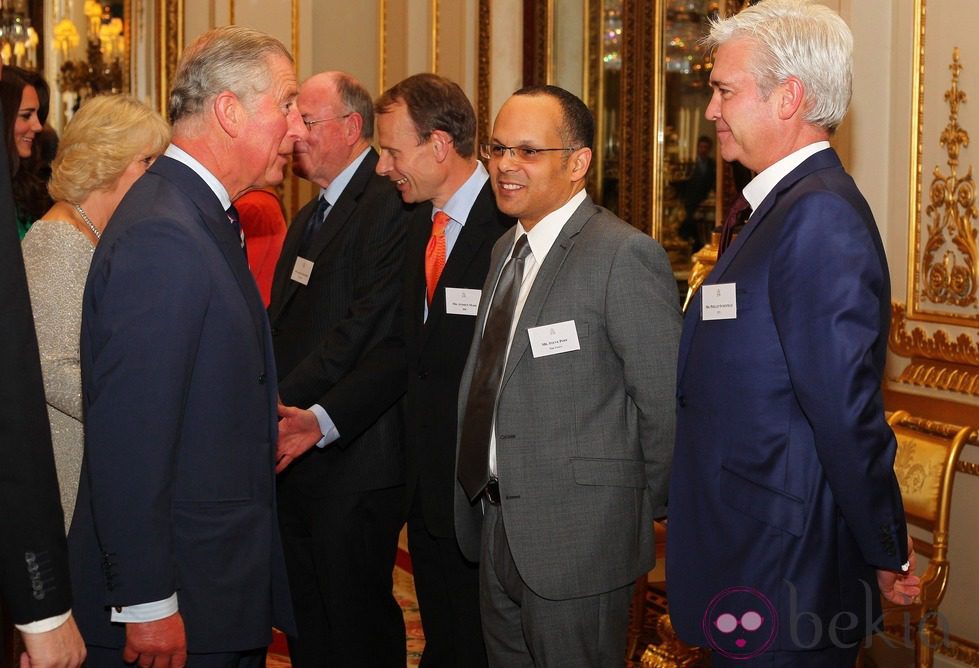 El Príncipe Carlos en la recepción a la prensa en Buckingham Palace