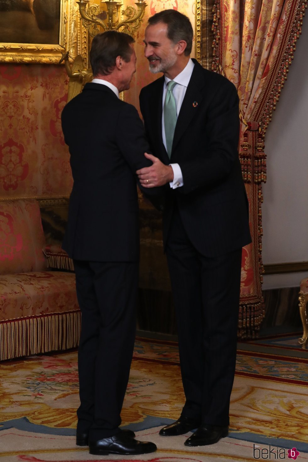 El Rey Felipe saluda a Enrique de Luxemburgo en la recepción por la Conferencia sobre el Cambio Climático