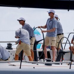 El Rey Felipe llevando el timón del Aifos en el primer día de regatas de la Copa del Rey de Vela 2021