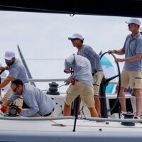 El Rey Felipe llevando el timón del Aifos en el primer día de regatas de la Copa del Rey de Vela 2021