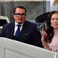 Oscar Kylberg y Maria Nilsson en el bautizo de Julian de Suecia