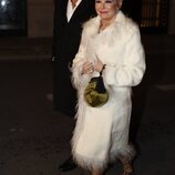 Ana Rosa Quintana y su marido llegando a la fiesta de Navidad 2022 de Unicorn