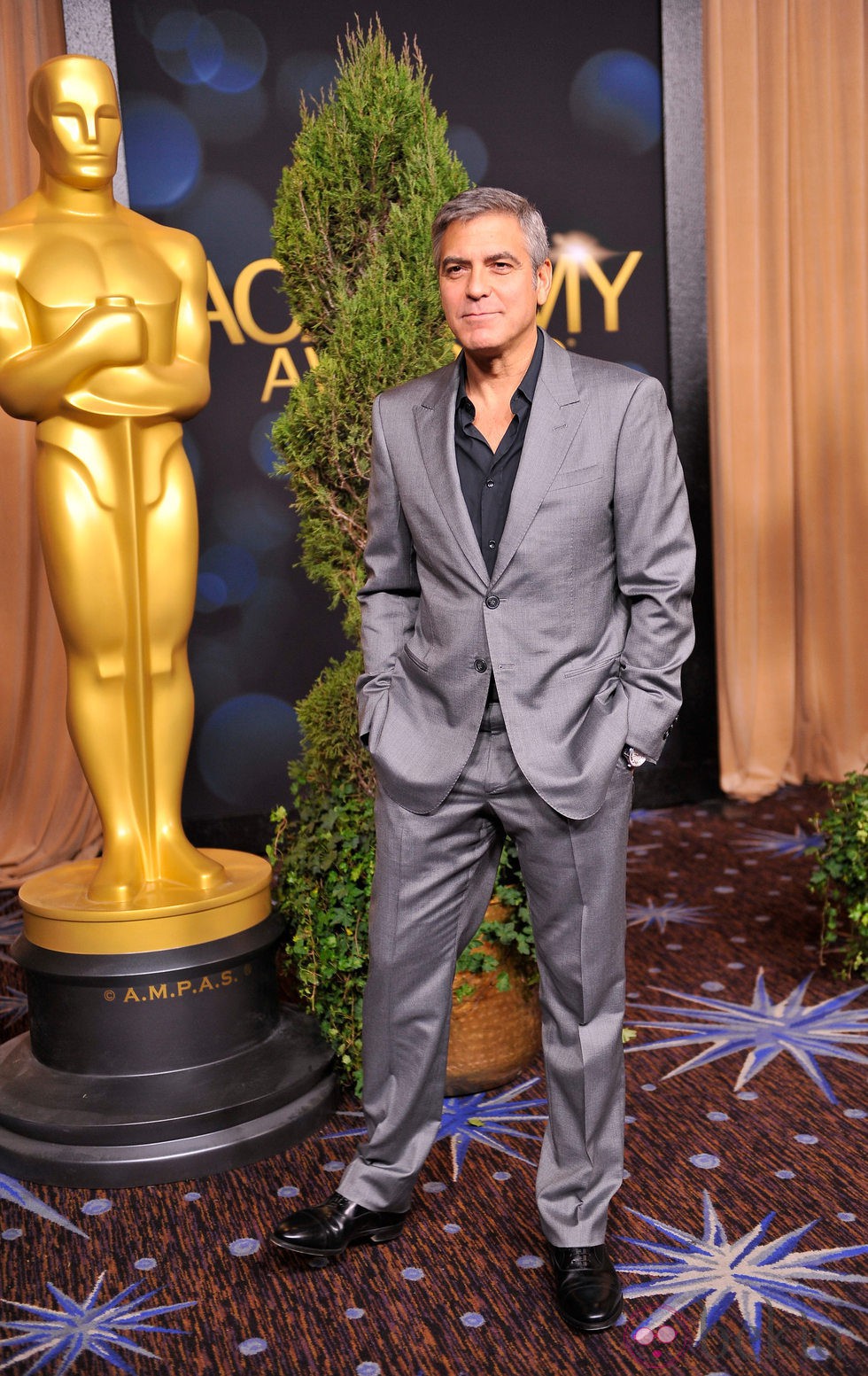 George Clooney en la comida de los nominados a los Oscar 2012