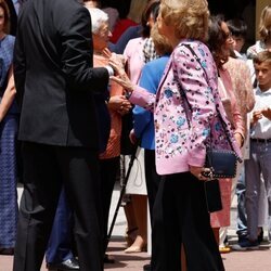 El Rey Felipe VI y la Reina Sofía hablando en la Confirmación de la Infanta Sofía