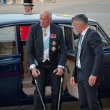 Harald de Noruega con muletas en la cena en su honor en Amalienborg