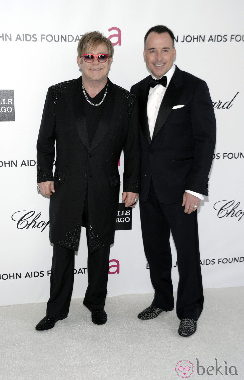 Elton John y David Furnish en la fiesta del cantante tras los Oscar 2012