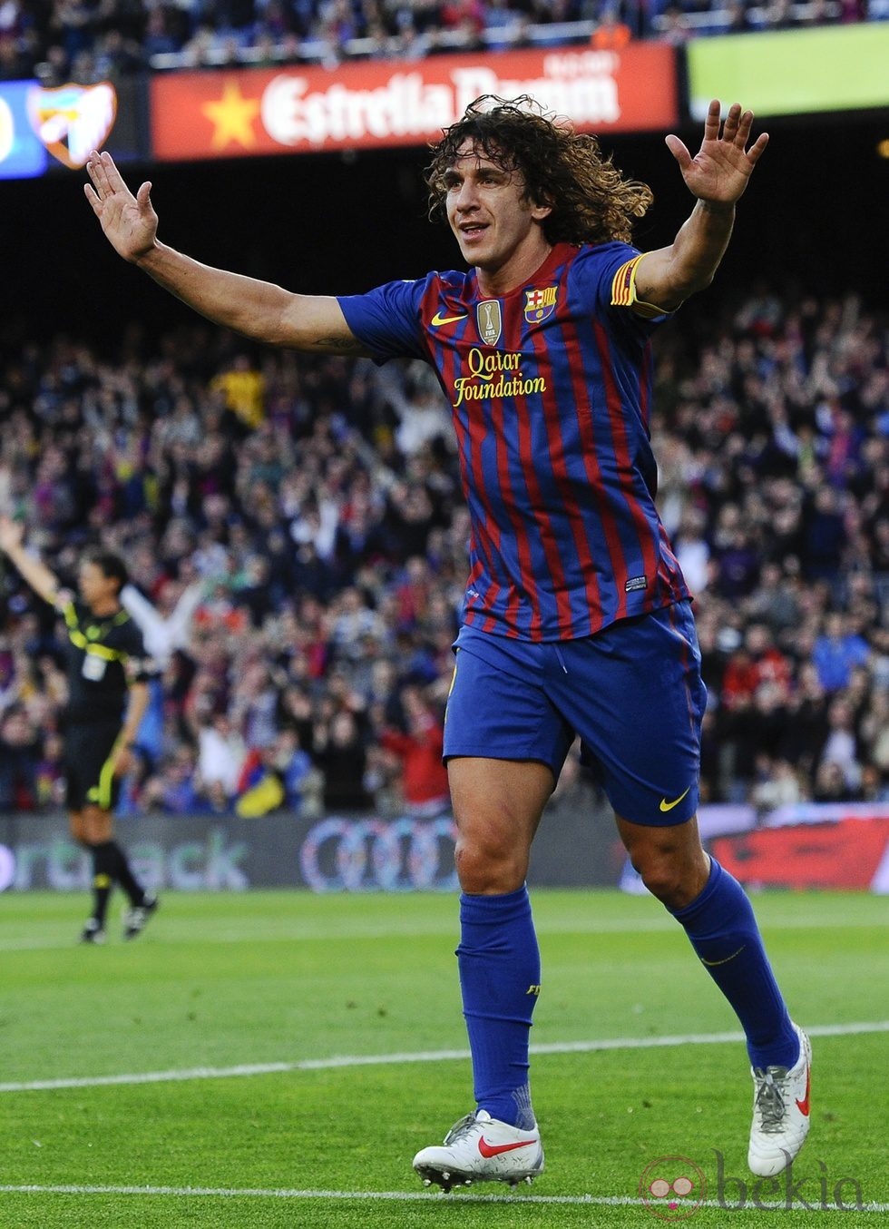 Carles Puyol celebra un gol del Barça