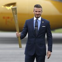 David Beckham con la antorcha olímpica