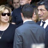 Los padres de Sara Carbonero en el funeral de Santos Arévalo