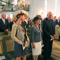 Marta Luisa, Sonia y Harald de Noruega en una misa en recuerdo a las víctimas de Utoya