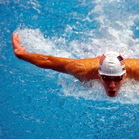 Michael Phelps nadando en Sidney 2000