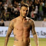 David Beckham luce sus tatuajes