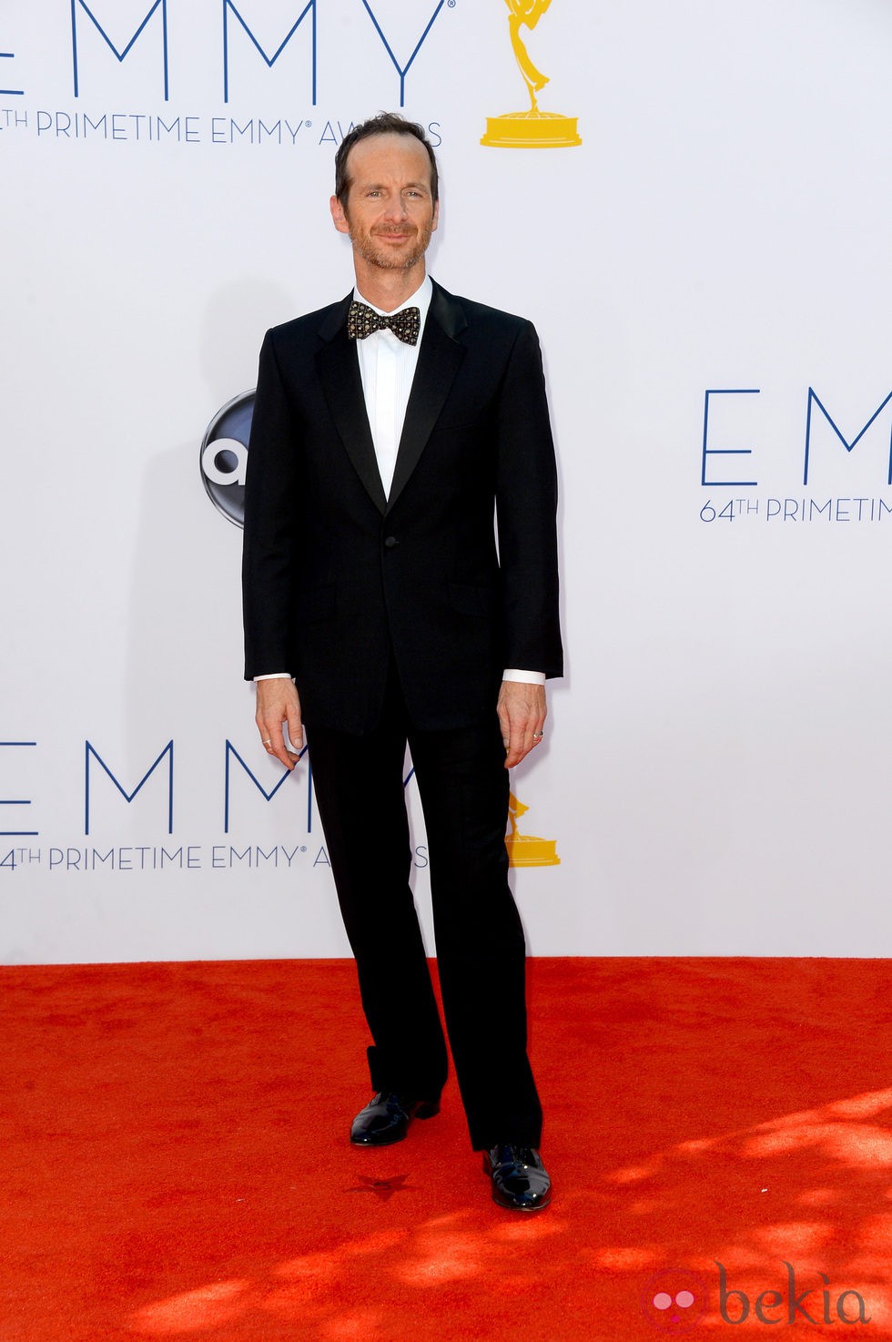 Denis O'Hare en la alfombra roja de los Emmy 2012