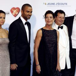 Axelle, Tony Parker, Carolina de Mónaco y Axelle en una gala benéfica en Monte-Carlo