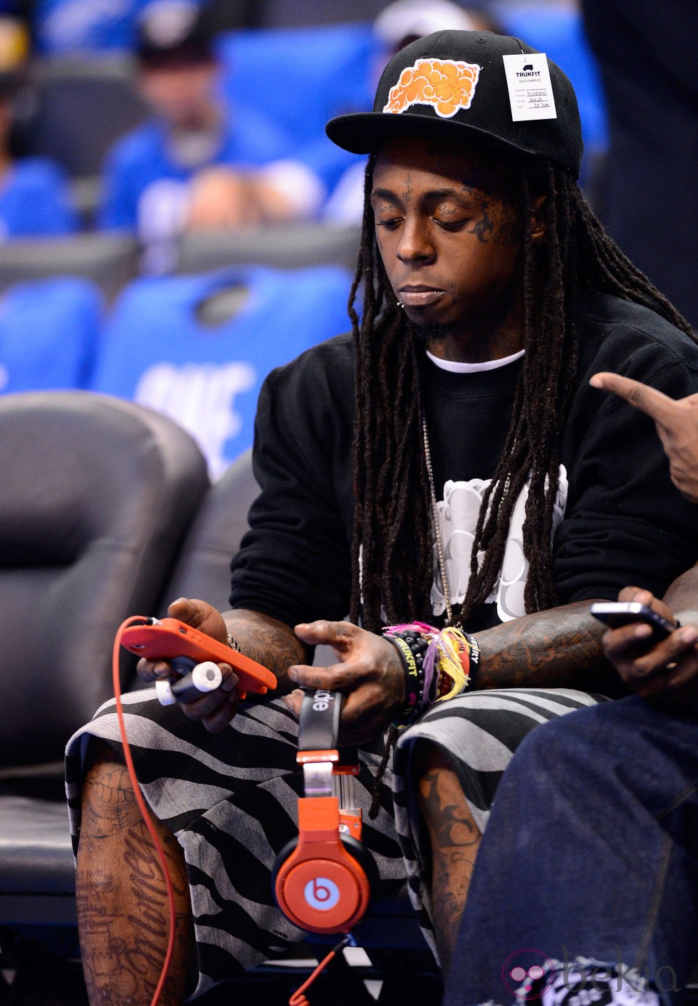 Lil Wayne con la música en su iPhone