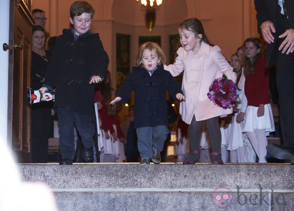 Christian, Vicente e Isabel de Dinamarca en un concierto de Navidad