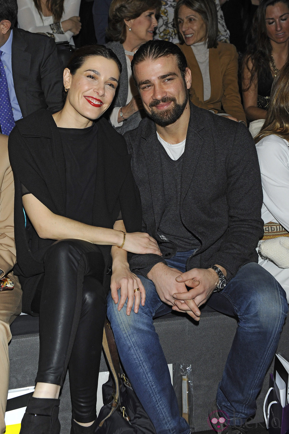 Raquel Sánchez Silva y Mario Biondo en el desfile de Ion Fiz en Madrid Fashion Week otoño/invierno 2013/2014