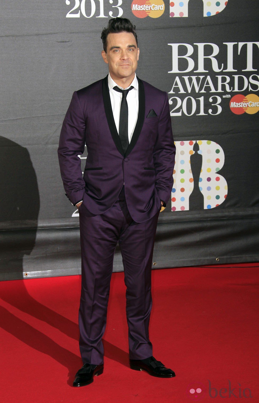 Robbie Williams en la alfombra roja de los Brit 2013