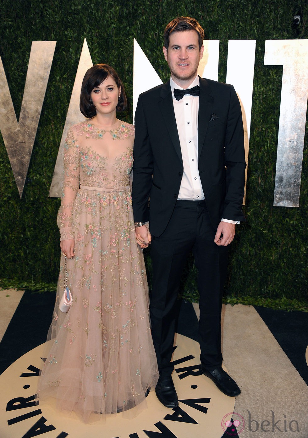Zooey Deschanel y Jamie Linden en la fiesta post Oscar 2013 organizada por Vanity Fair