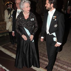 La Princesa Cristina y el Príncipe Carlos Felipe en la cena al gala al presidente de Turquía