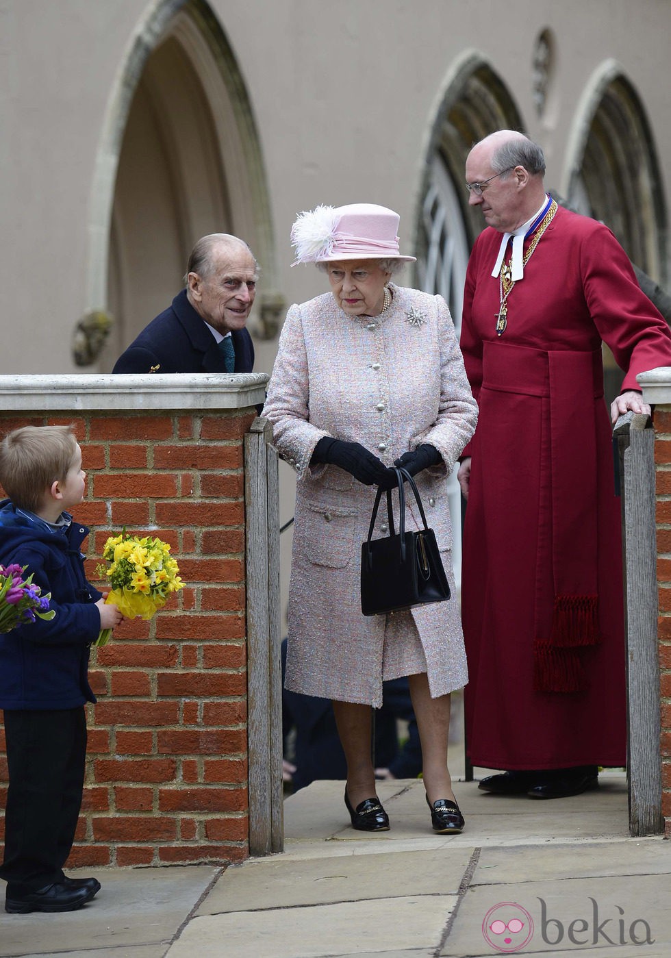 La Reina Isabel II y el Duque de Edimburgo en la Misa de Pascua 2013