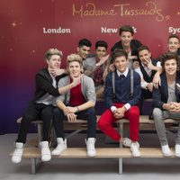 Los One Direction con sus figuras de cera en el Madame Tussauds de Londres