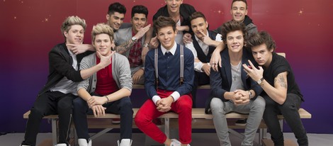 Los One Direction con sus figuras de cera en el Madame Tussauds de Londres