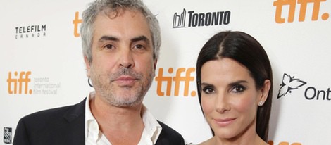 Alfonso Cuarón y Sandra Bullock en el estreno de 'Gravity' en el Festival Internacional de Cine de Toronto 2013