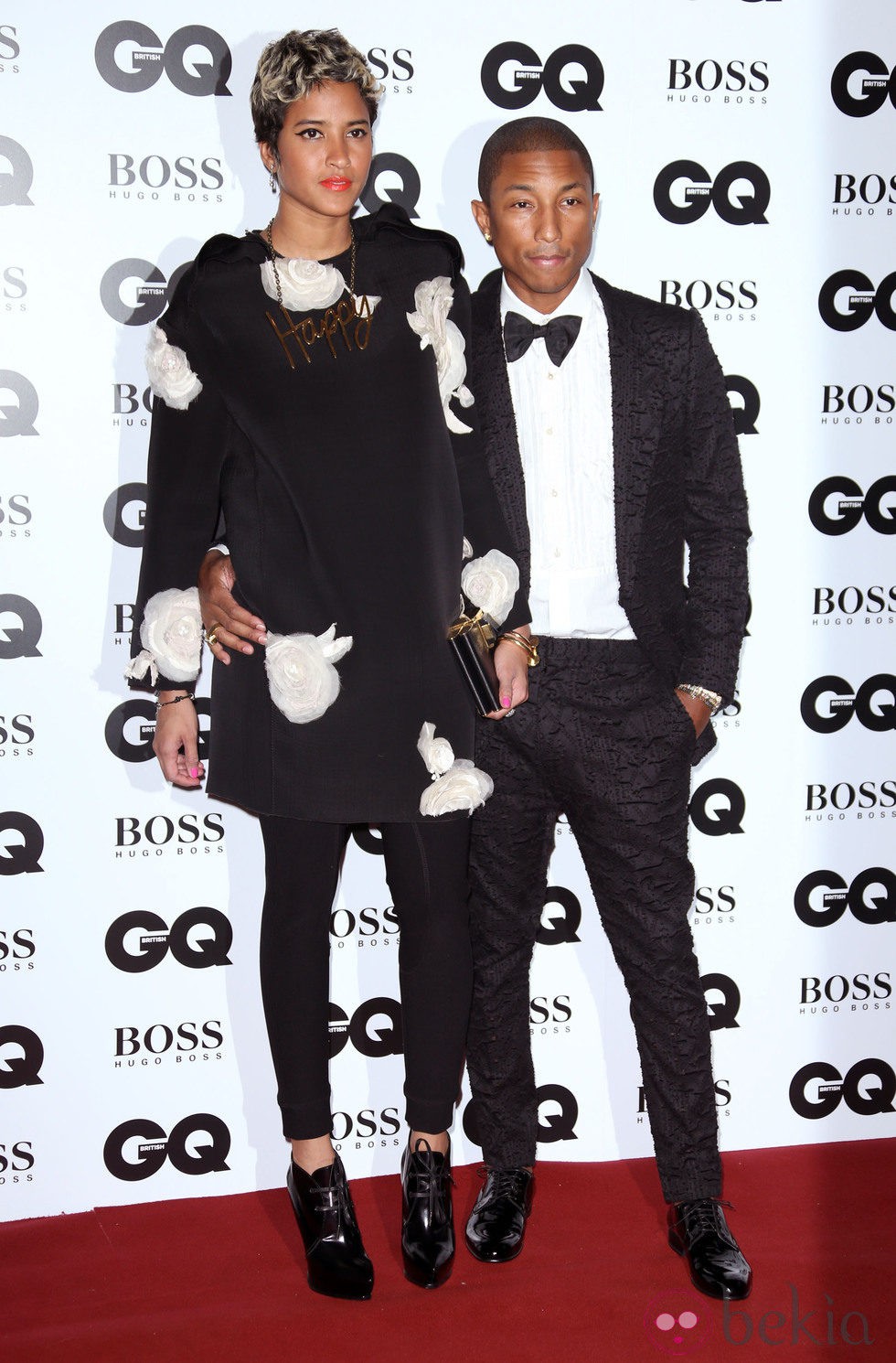Helen Lasichanh y Pharrell Williams en los Premios del Año GQ Men 2013 en Londres