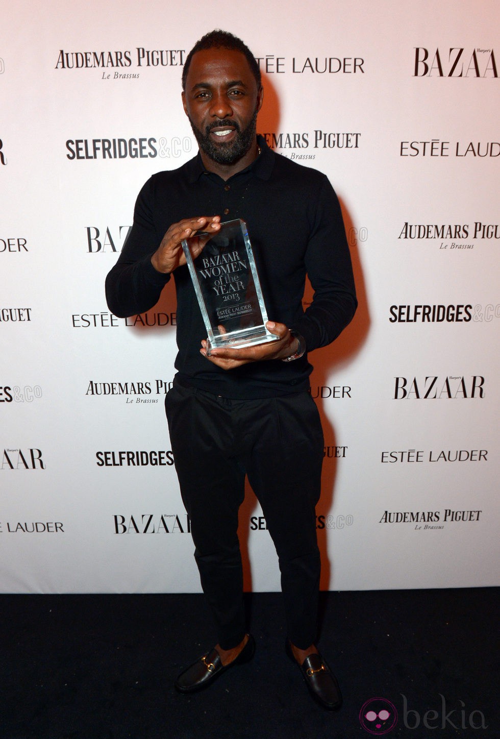 Idris Elba en la fiesta Harper's Bazaar Mujer del Año 2013