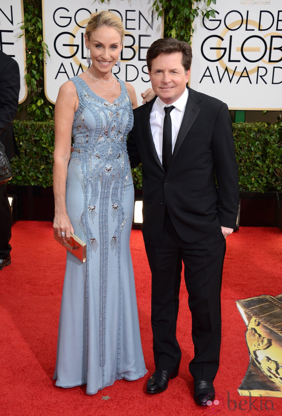 Michael J. Fox y Tracy Pollan en la alfombra roja de los Globos de Oro 2014