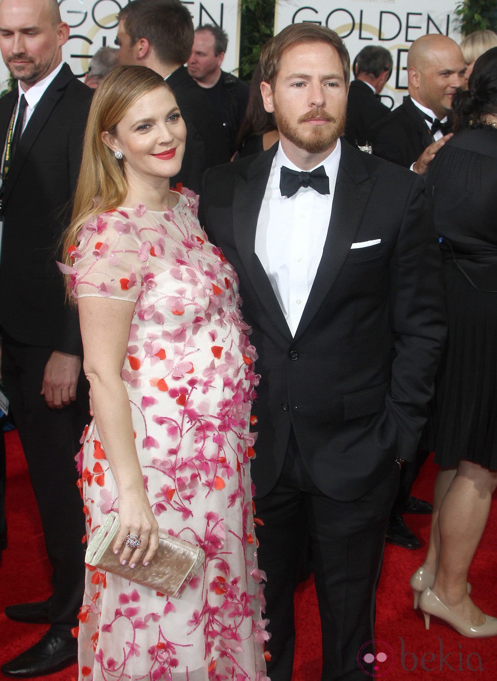 Drew Barrymore y Will Kopelman en la alfombra roja de los Globos de Oro 2014