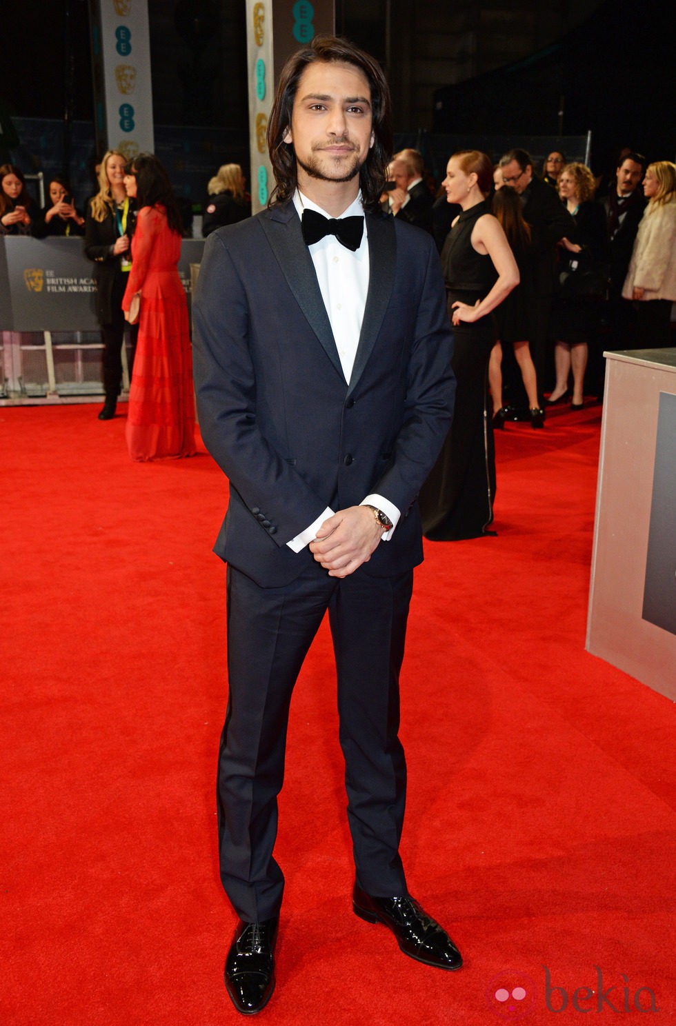 Luke Pasqualino en la alfombra roja de los Premios BAFTA 2014